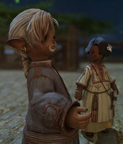 A Plainsfolk Lalafellin man discusses with his granddaughter, Mitan. He wears a wore loose top in grey with his blond and greying hair in a braid.